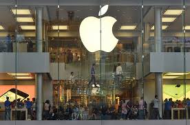 Apple shares down $6 despite higher earnings