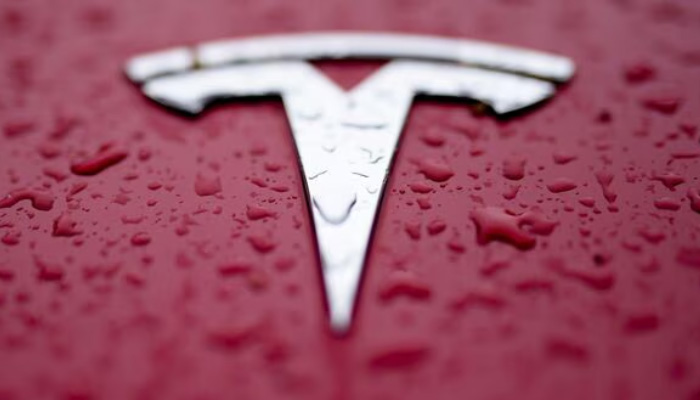 Tesla shares have climbed $5 from the opening levels