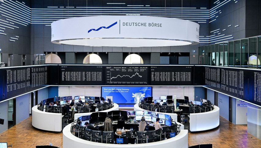 DAX trading floor with large screen in background